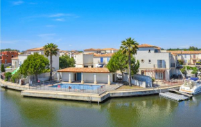 Beautiful home in Aigues-Mortes with WiFi, Outdoor swimming pool and 3 Bedrooms